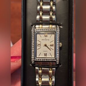Boussoevie NIB Women’s silver & goldtone watch w crystals around the bezel.